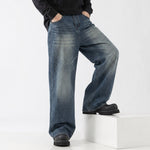 Dashiell™ | The Relaxed Wide-Leg Faded Jeans